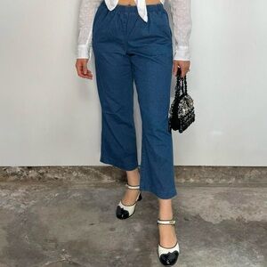Vintage blue high waisted denim trousers with elastic waistband. Women’s size 4